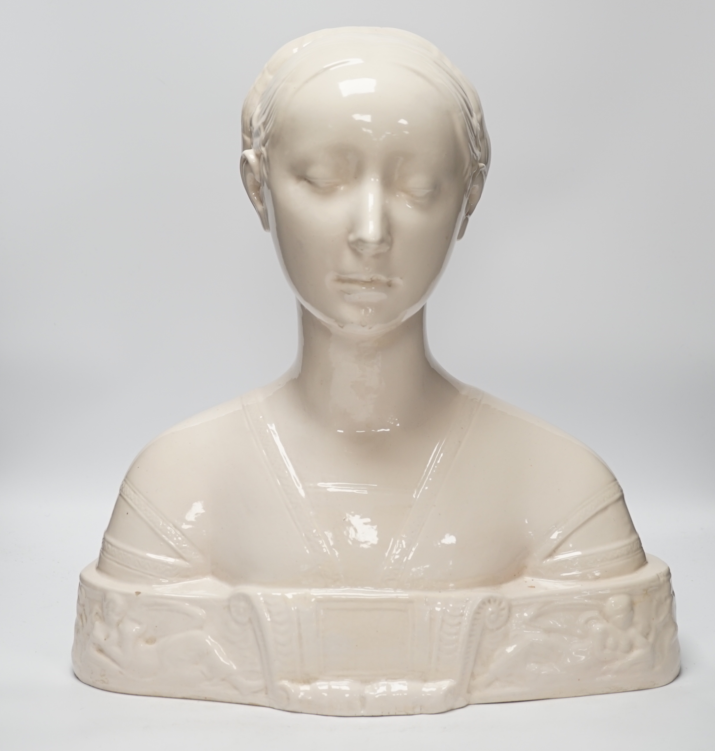 After Francesco Laurana (1430-1502). A tin glazed terracotta bust of Battista Sforza, Duchess of Urbino, 44cm high